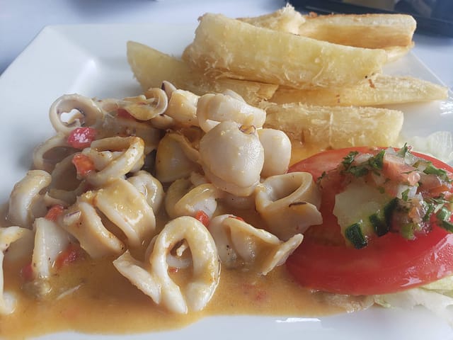 Calamari in Coconut Sauce with Fried Yucca